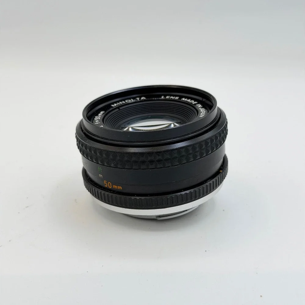 Minolta MC Rokkor-PF 50mm f/2 Lens with 55mm Skylight 1A Hood SR Mount 1126884